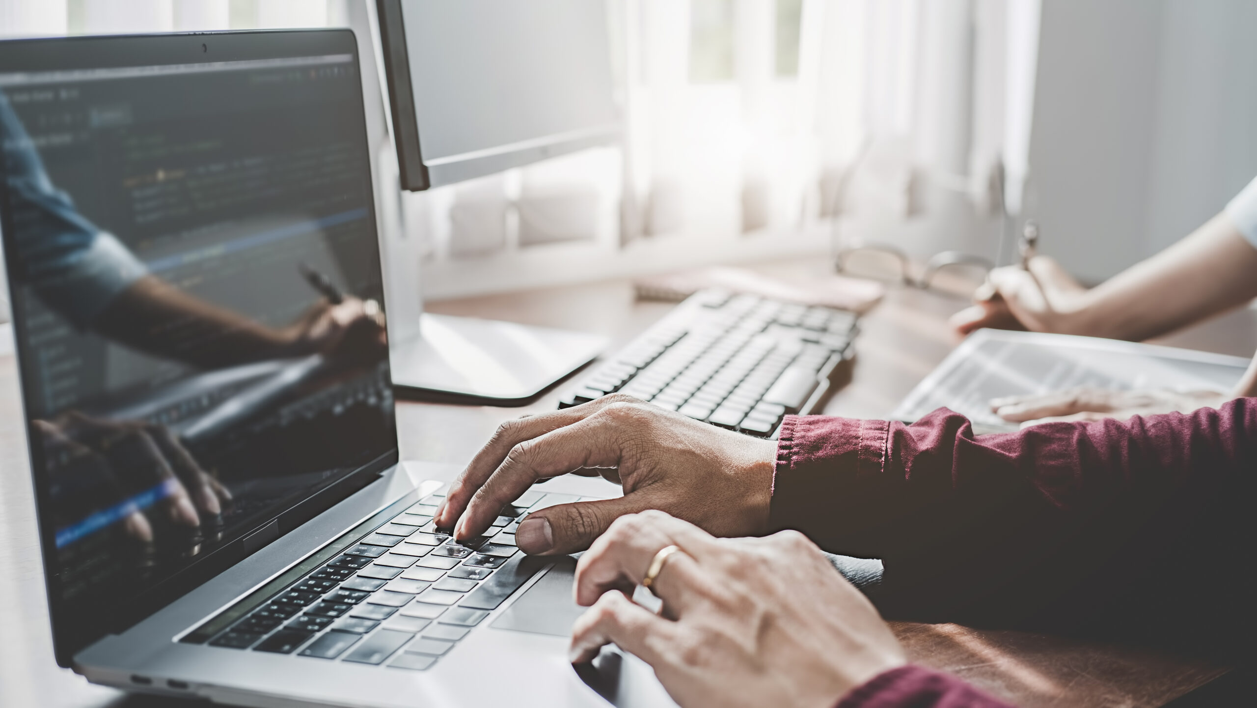 programmer working in a software development and coding technolo