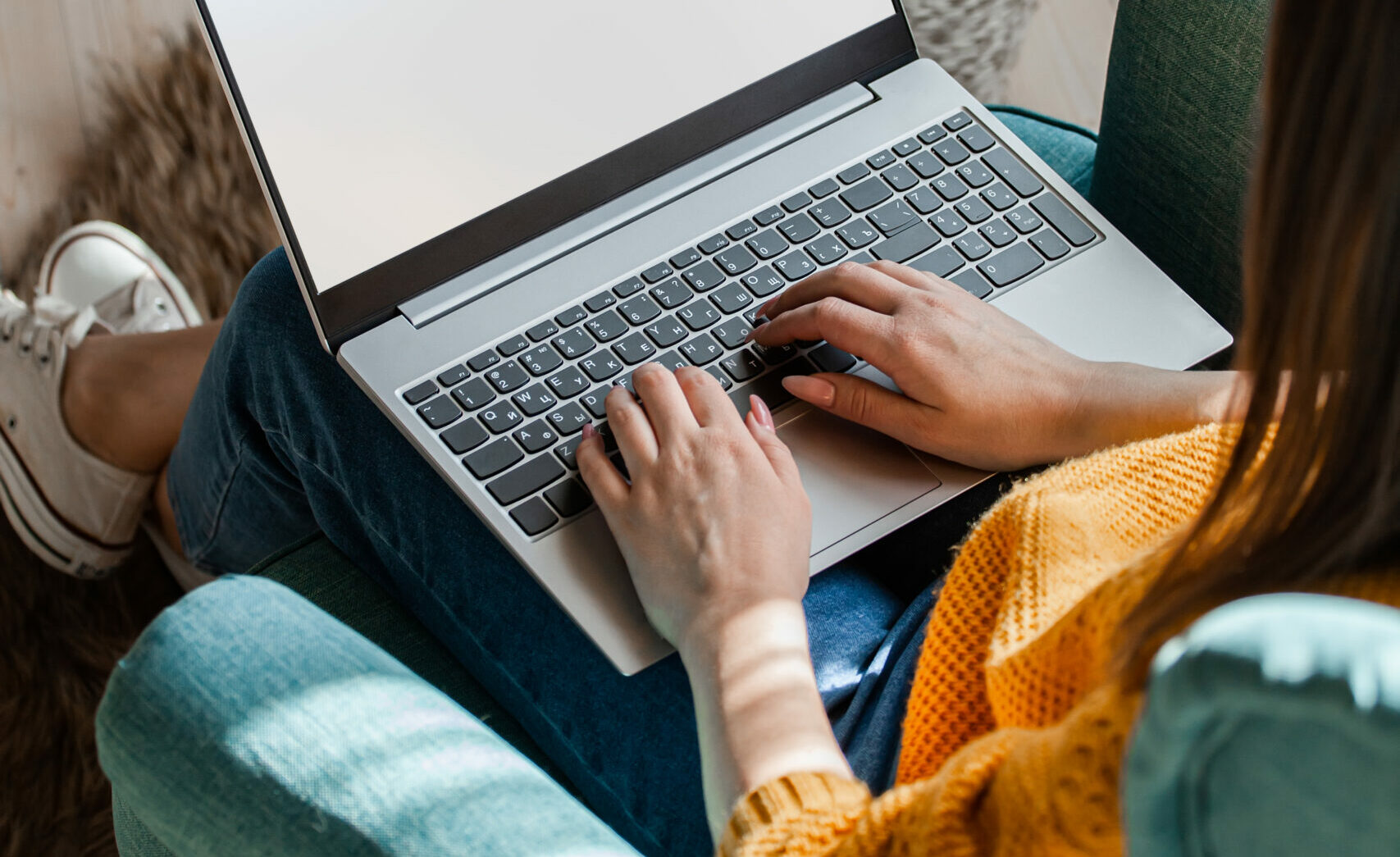 young woman using laptop screen blank, mock up, work home